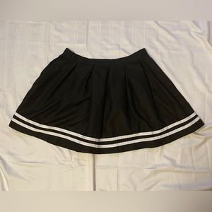 Large black Hot Topic skirt with white lines.
